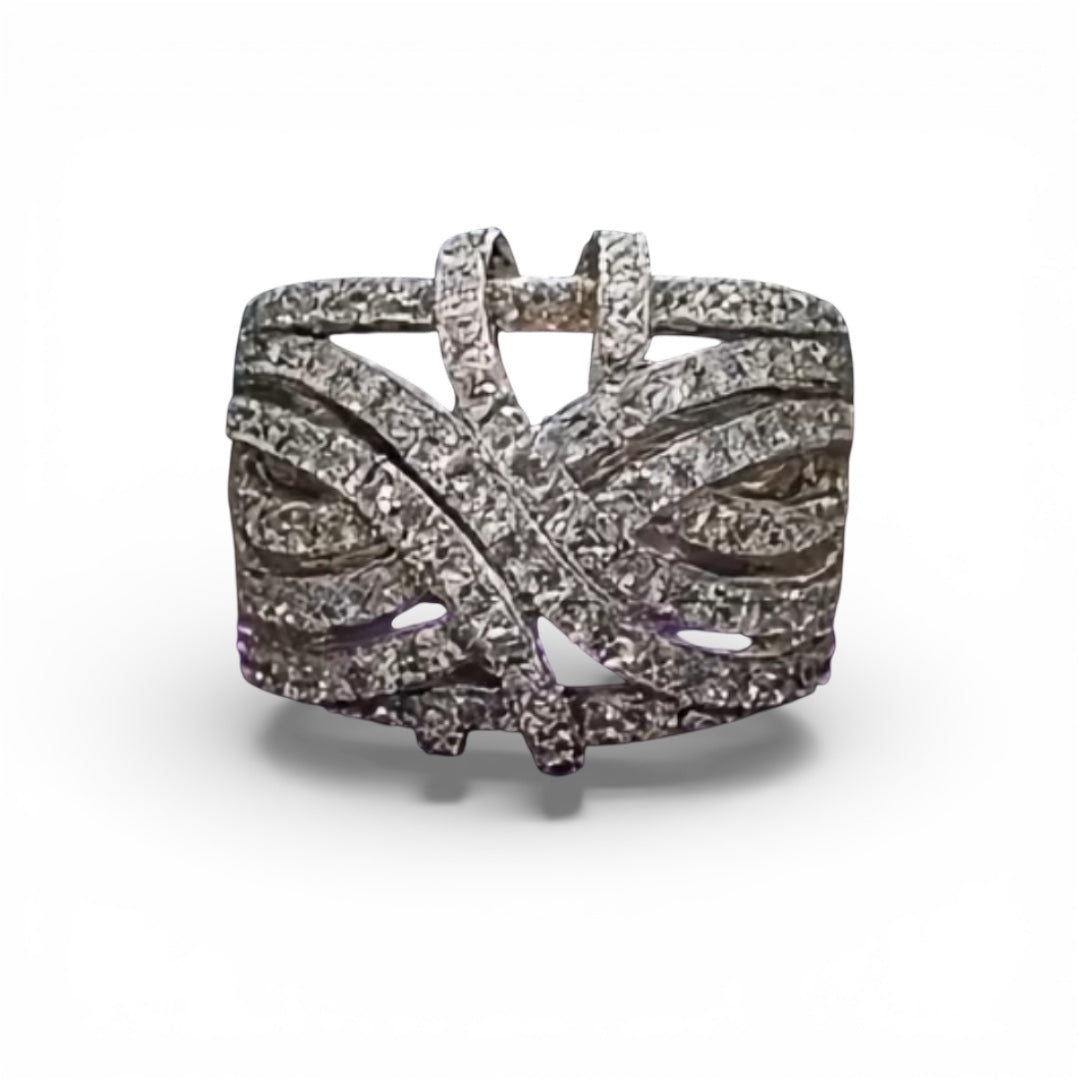 Anillo de nudo cuajado en diamantes en oro blanco 14k